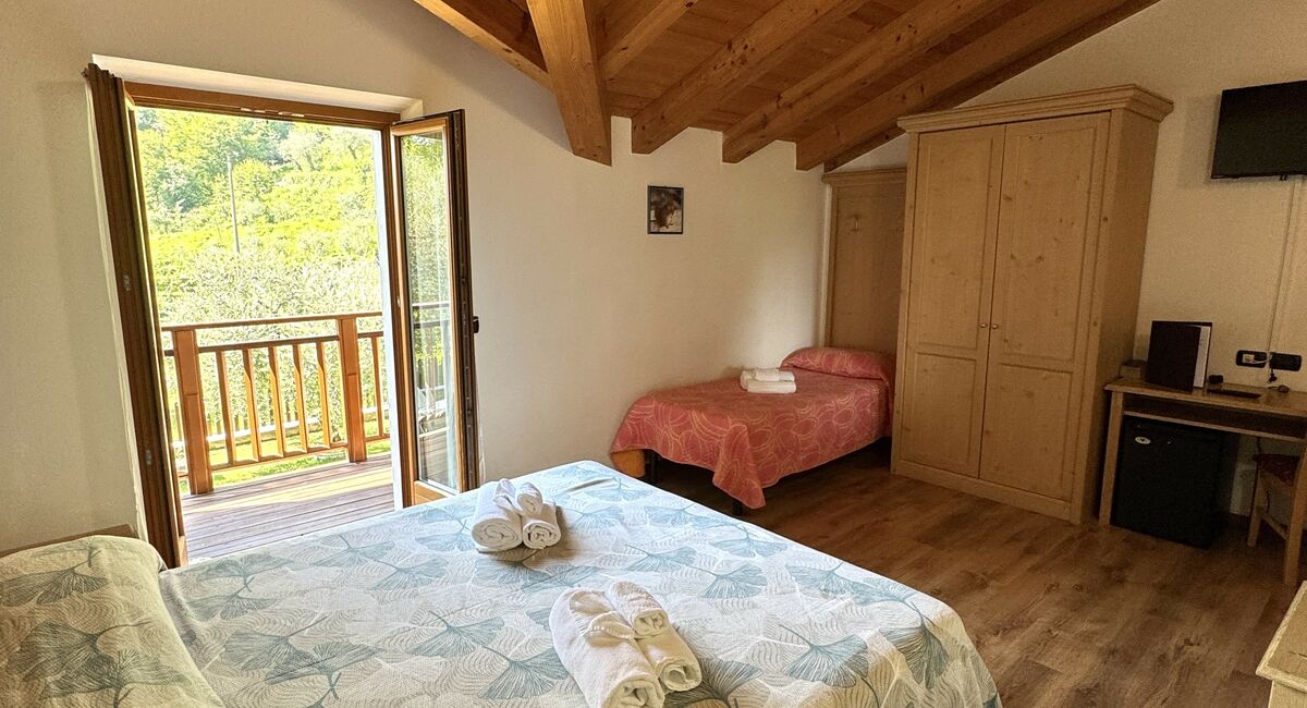 Camera famigliare | Più spazio, più comfort e ambienti pensati per condividere il soggiorno senza rinunciare alla tranquillità.